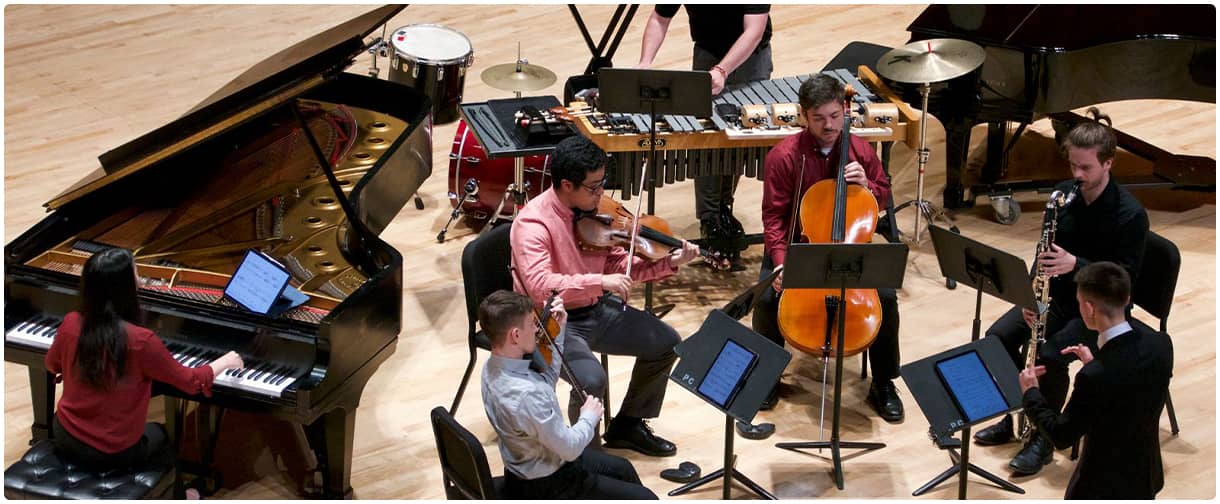 Steinway pianos on stage: UGA&nbsp;All-Steinway University.