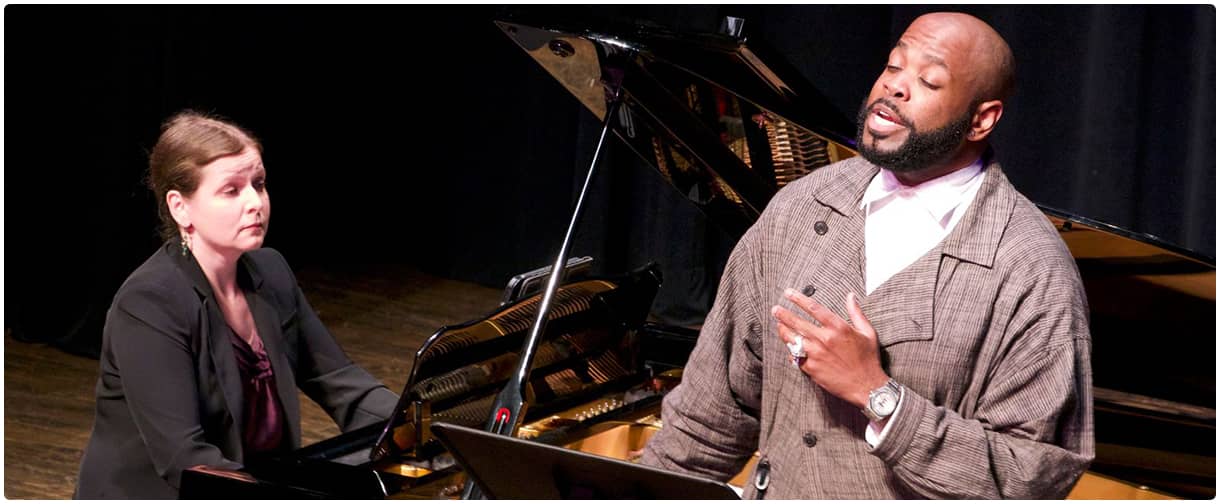 Steinway pianos on stage: UGA&nbsp;All-Steinway University.